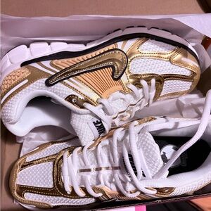 Nike Women's White and Gold Athletic Sneakers